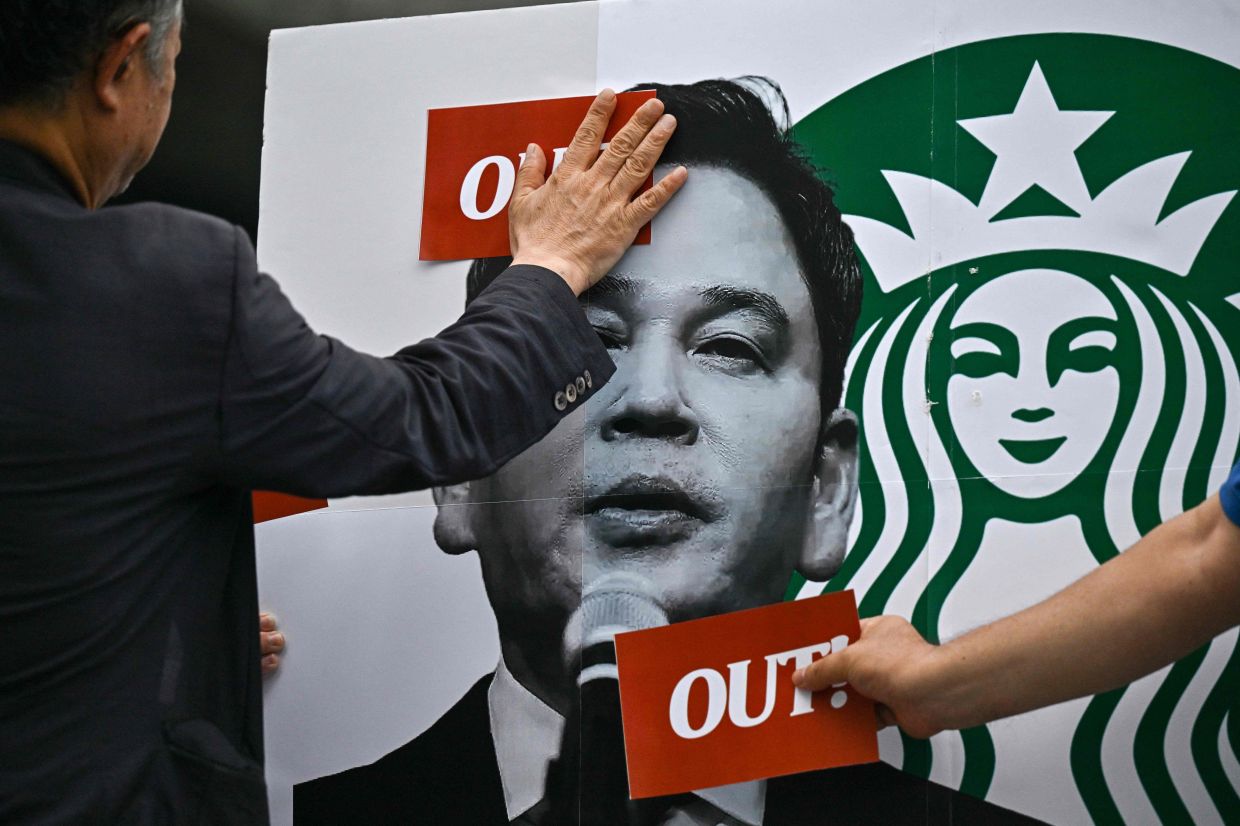 South Korean police question Shinsegae executive over Starbucks 'Tank Day' scandal