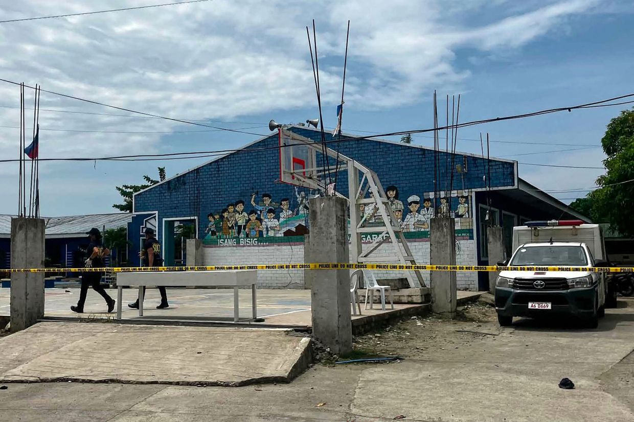 Philippines reels from school shooting as two teenage students arrested in Tacloban attack