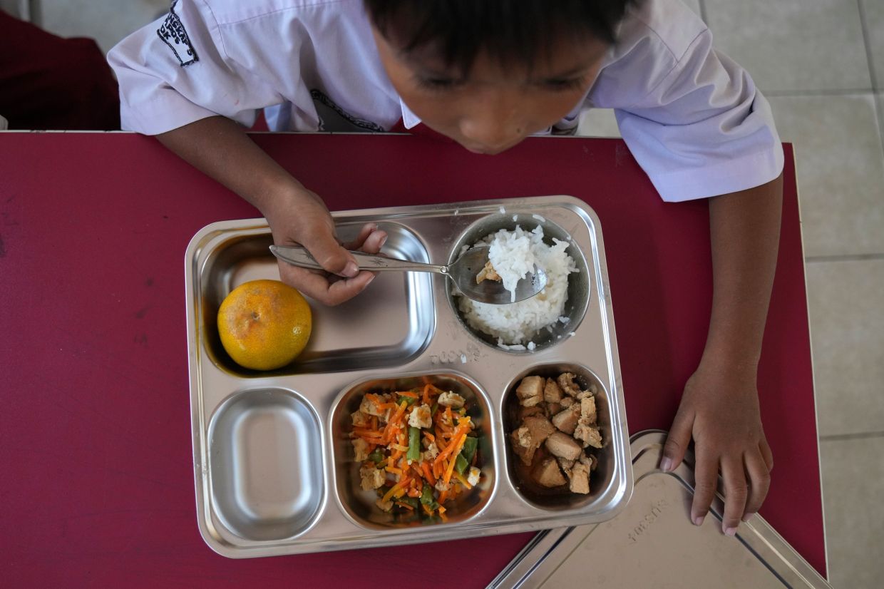 Indonesia's free meals scandal widens as anti-graft groups demand programme overhaul