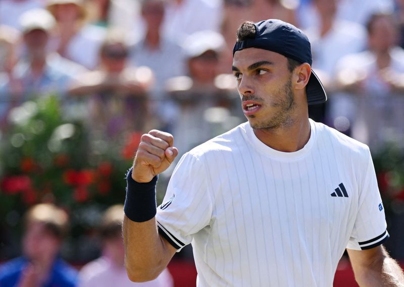 Cerundolo Captures Queen's Club Crown in Epic Grass-Court Battle with Paul